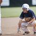 Saline junior Michael Barnett sticks his tongue out after sliding into third during a double header against Pioneer on Monday, May 20. Daniel Brenner I AnnArbor.com